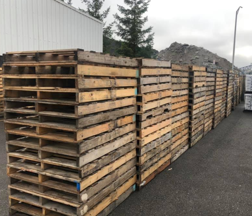 A row of wooden pallets stacked on top of each other