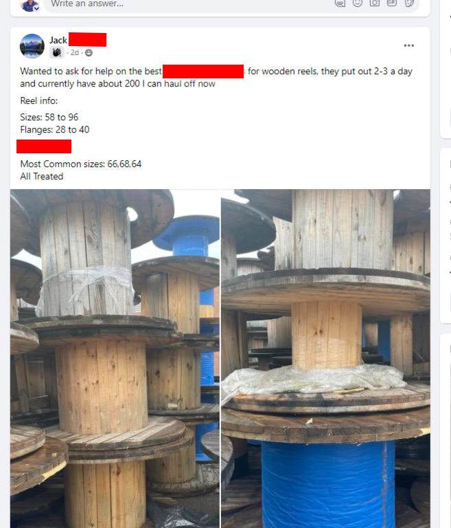 A bunch of wooden spools are stacked on top of each other
