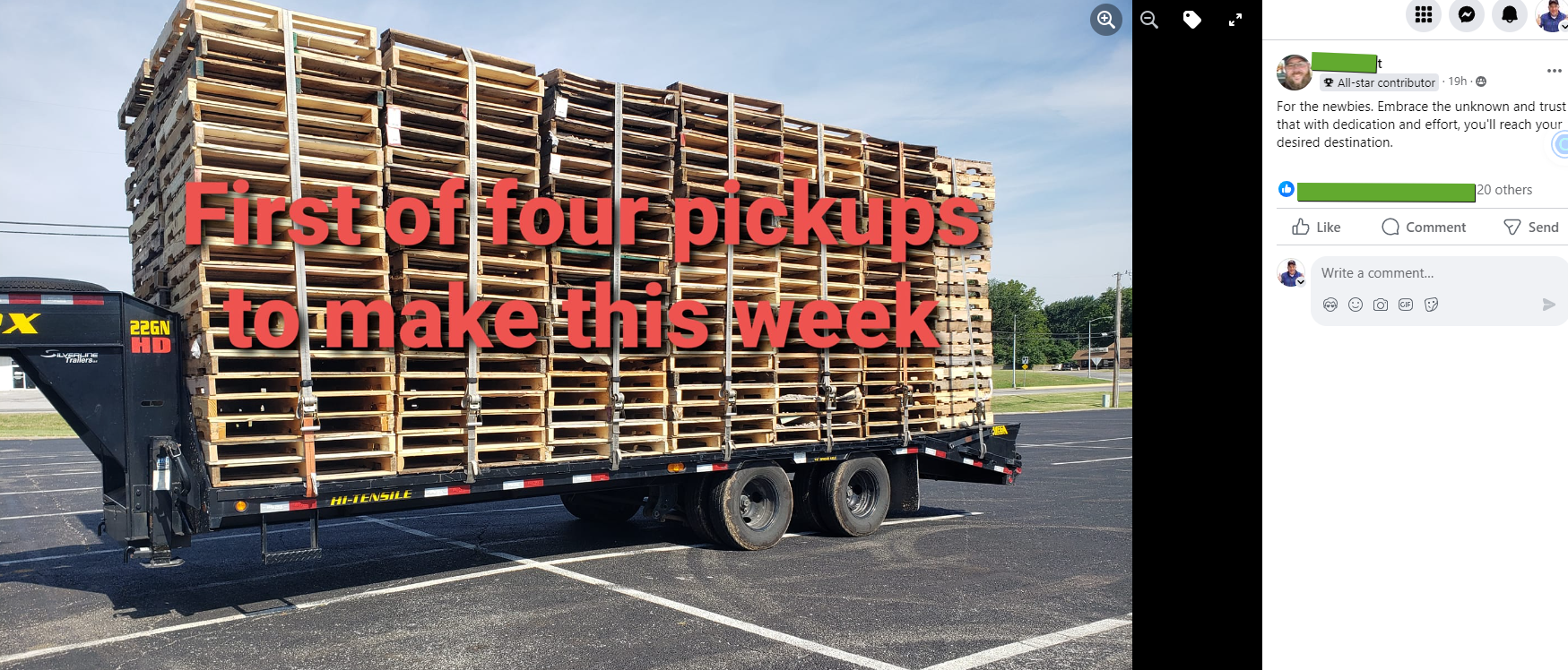 A truck filled with wooden pallets is parked in a parking lot.
