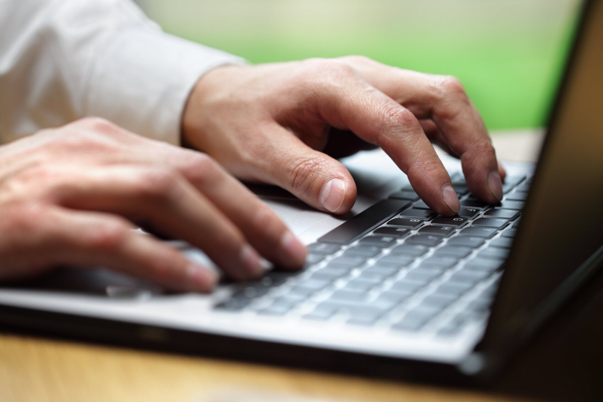 laptop man searching for listings