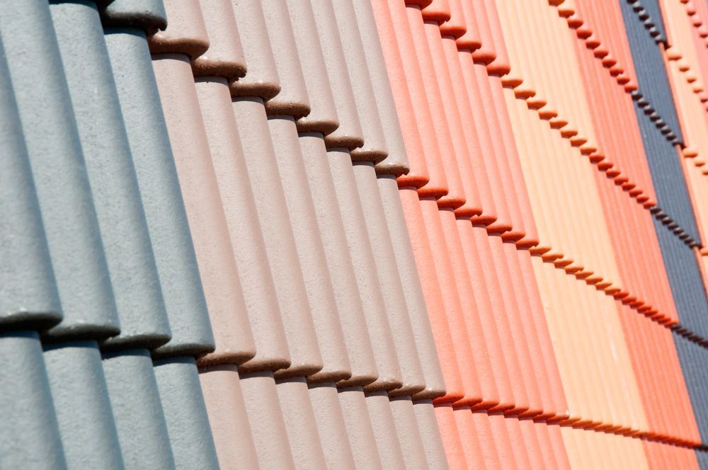 A Close Up of a Row of Blinds on a Building — Roof Restoration Masters In Boolaroo, NSW