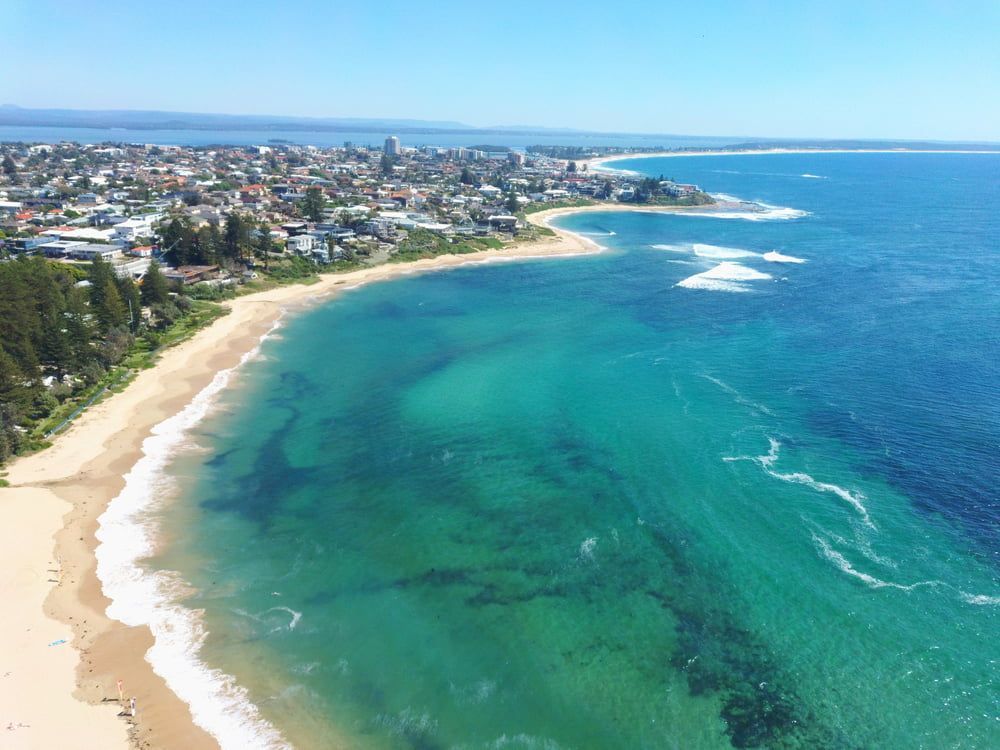 An Aerial View of a Beach and Ocean — Roof Restoration Masters In Central Coast, NSW