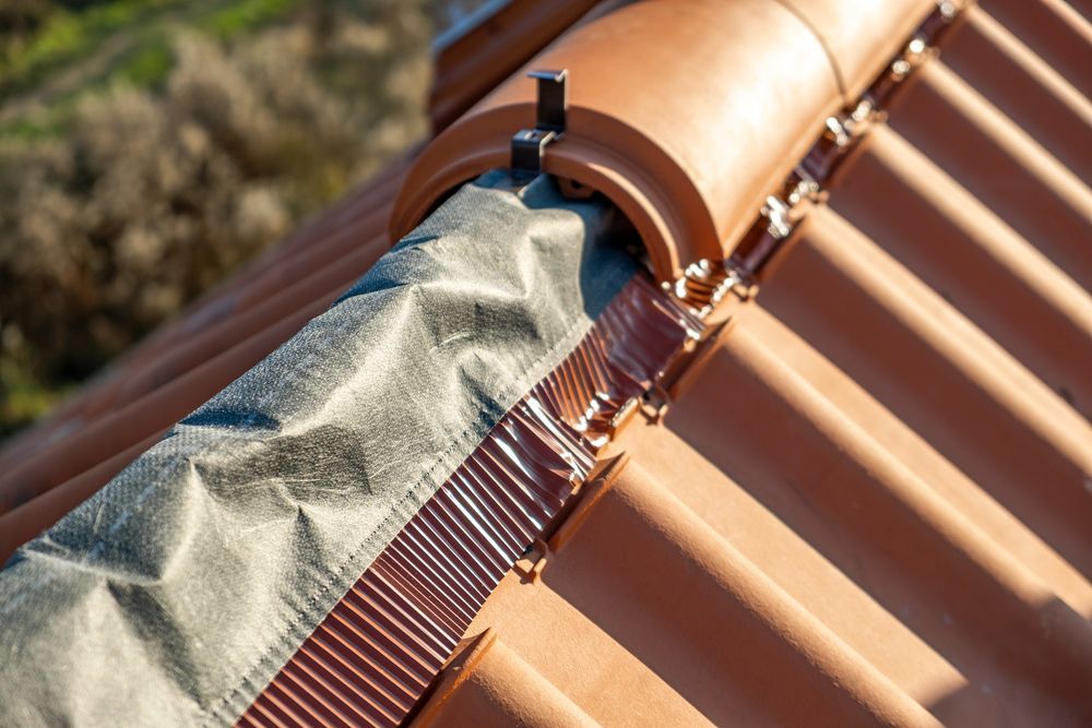 A Close Up of a Roof With a Roof Ridge — Roof Restoration Masters In Rutherford, NSW