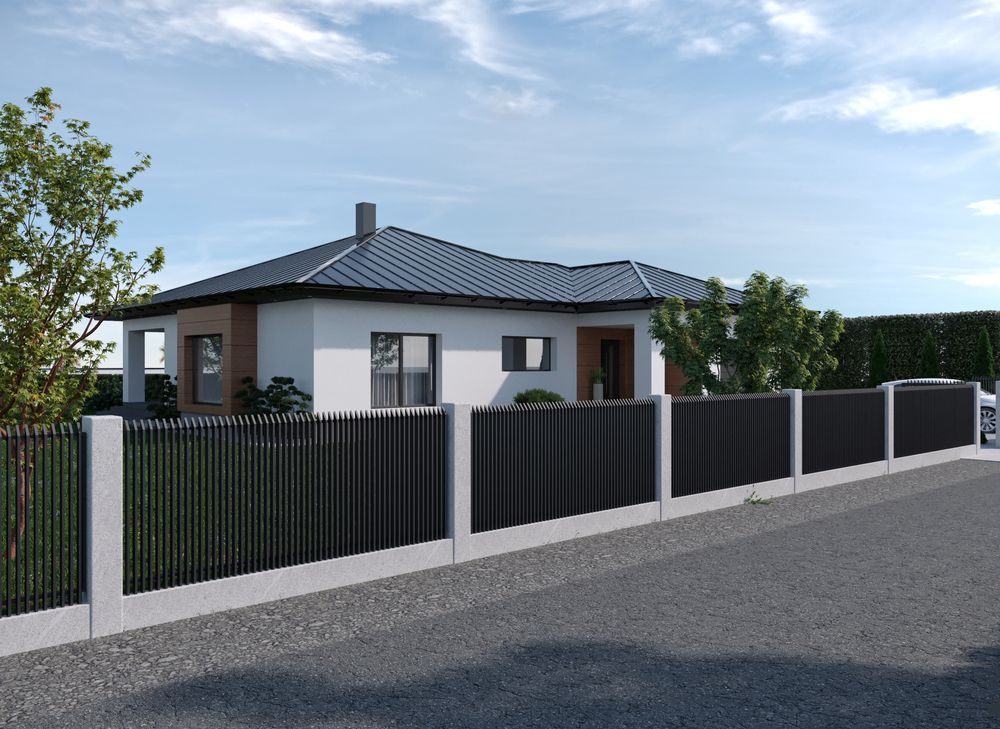 A White House With a Black Fence Around It — Roof Restoration Masters In Cameron Park, NSW