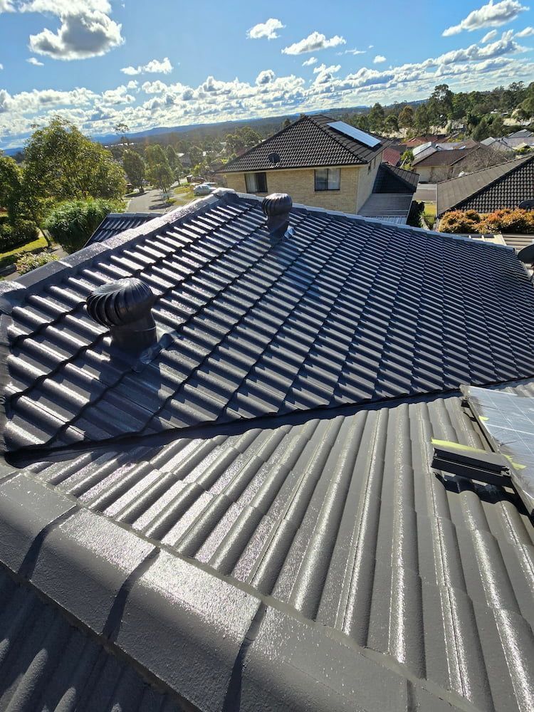 A Close Up of a Roof of a House — Roof Restoration Masters In Rutherford, NSW