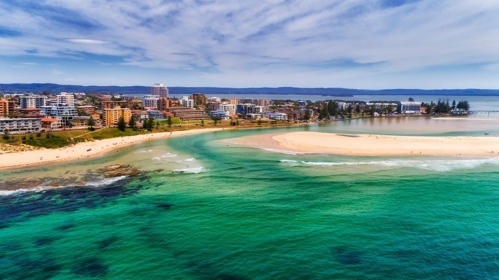 An Aerial View of a Beach With a City in the Background — Roof Restoration Masters In Tuggerah, NSW