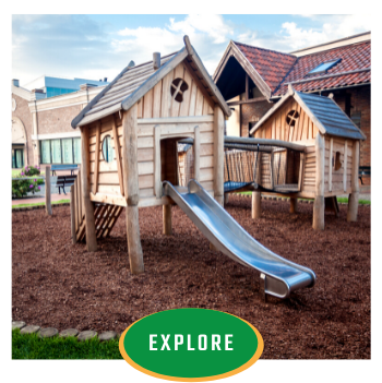 Wooden playground house with a metal slide and green “EXPLORE” button overlay