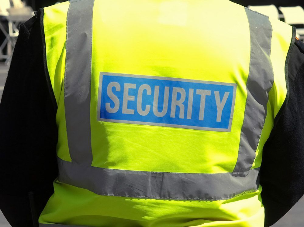 A Person Wearing a Yellow Vest on Top of the Hill — Professional Security Guards in Dalby, QLD