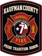 Logo for Kaufman County Emergency Services District 7 Fire in Crandall, Texas, featuring a red Maltese cross and a star.