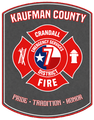 Logo for Kaufman County Emergency Services District 7 Fire in Crandall, Texas, featuring a red Maltese cross and a star.