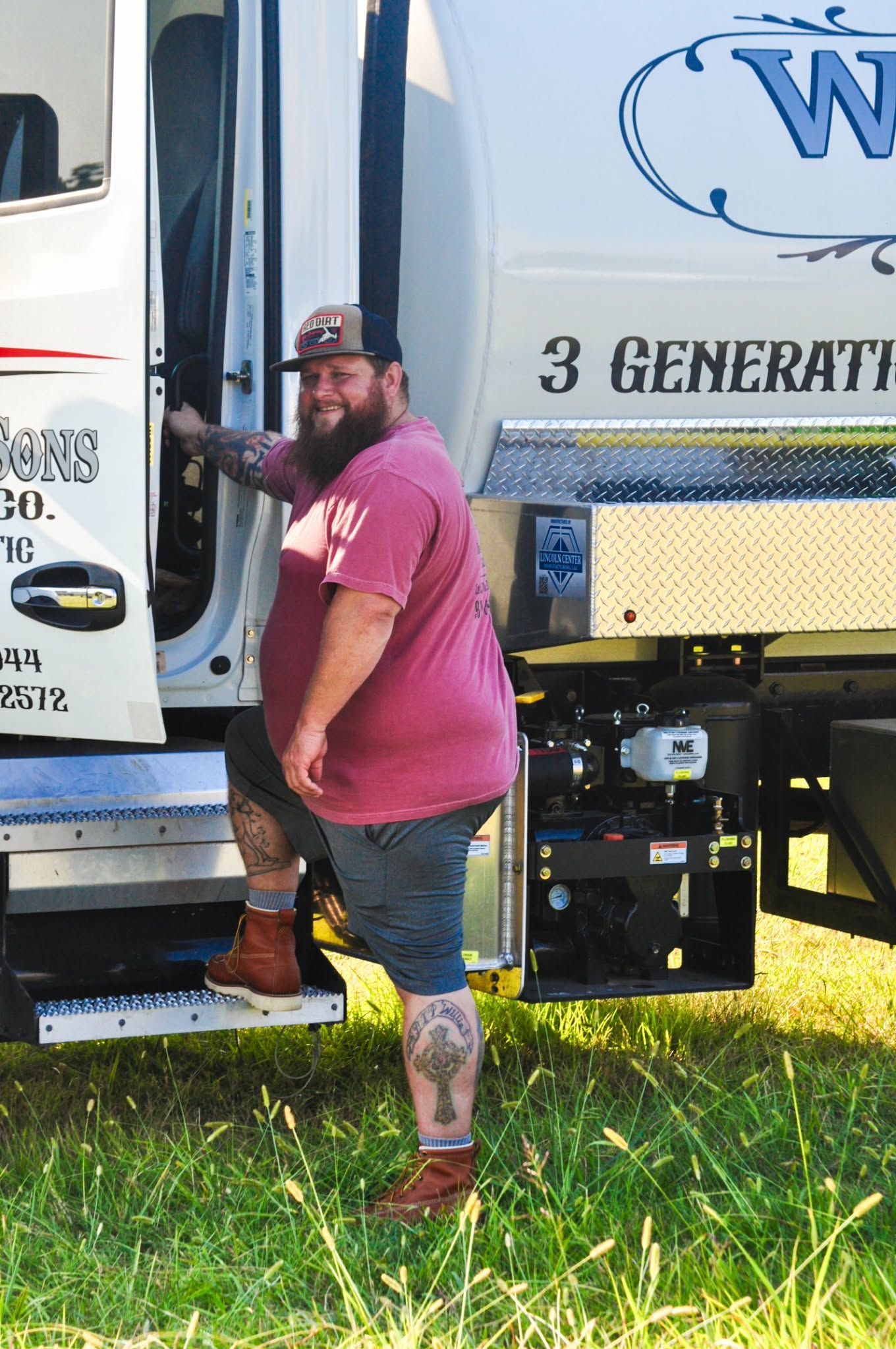 Willis & Sons Septic Co technician assessing a drain field repair site in Lawrenceburg, TN