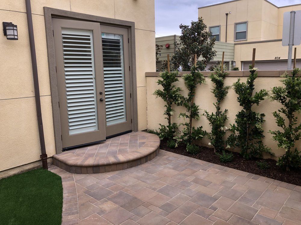 A house with a patio and a sliding glass door