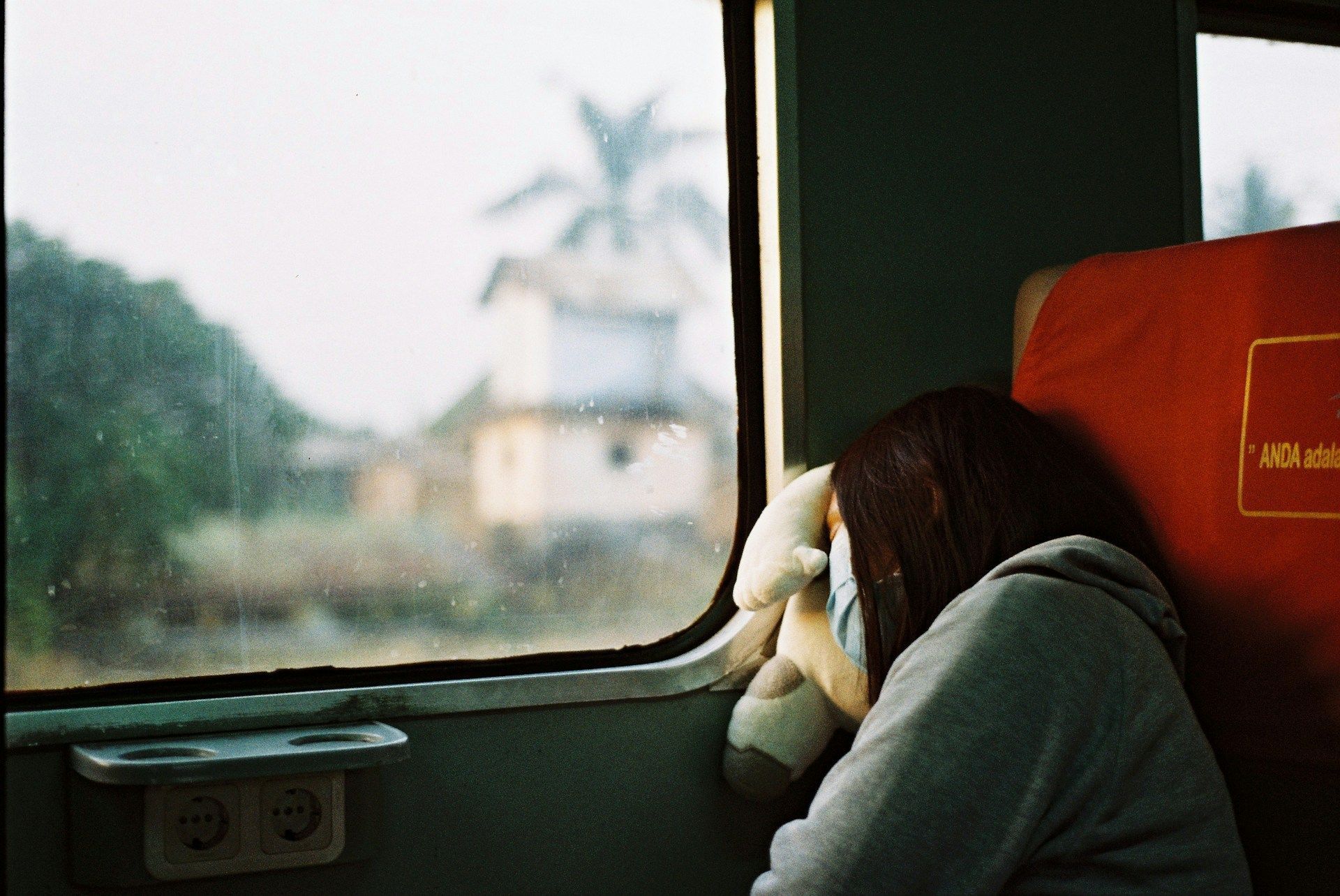 woman sleeping on the train