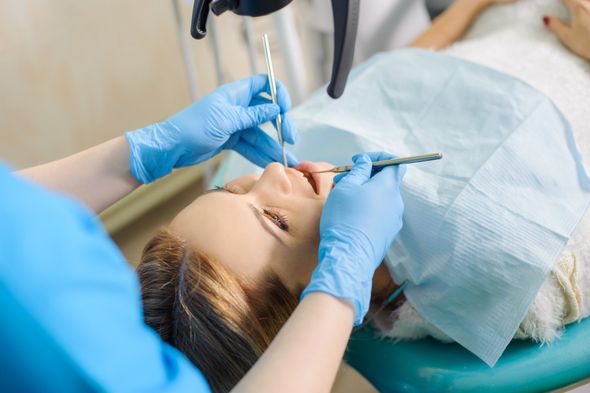 Dentist Treating Caries— Muskego, Wisconsin — Patrick J. Connell DDS Family Dentistry