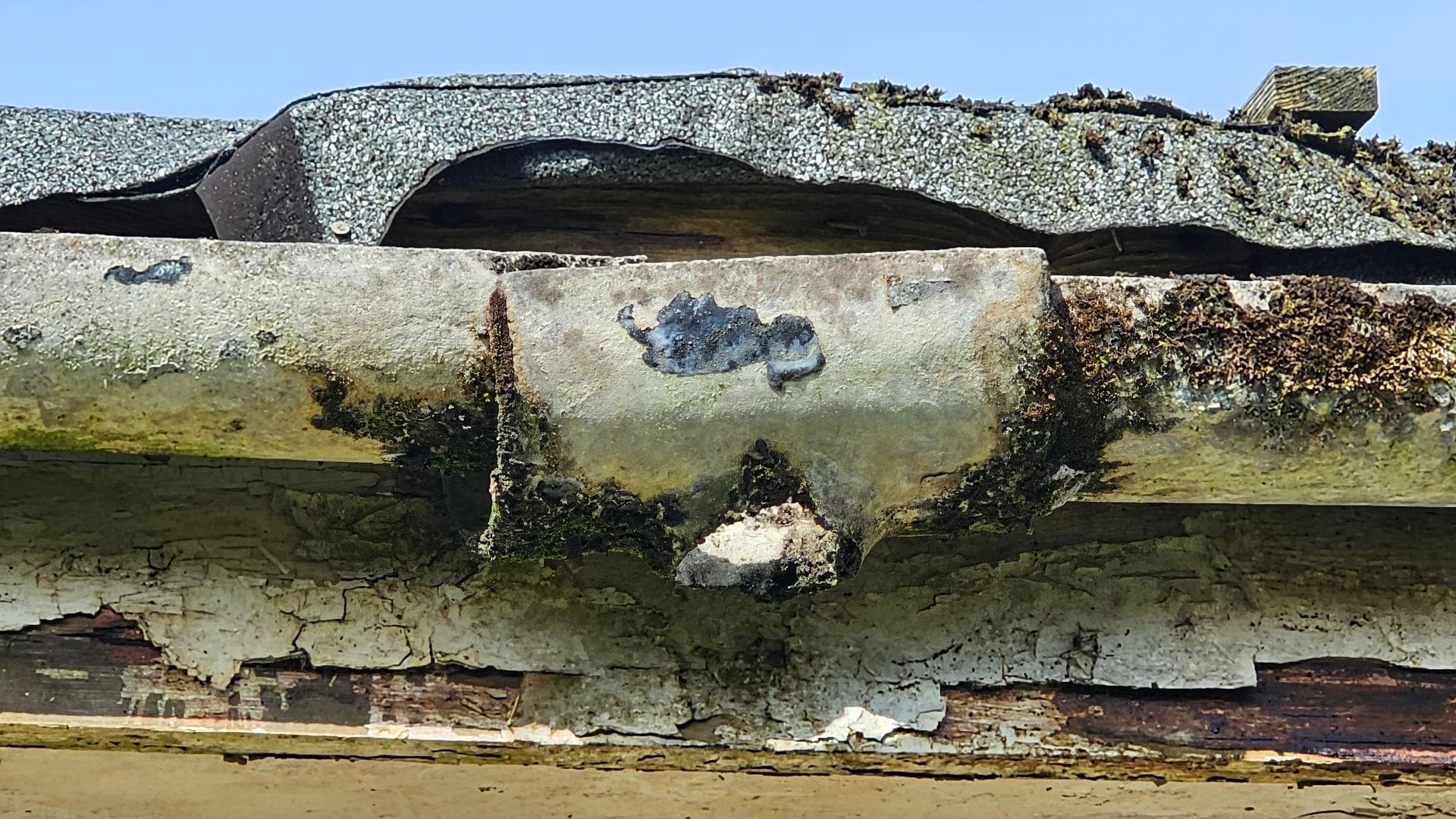 Visible asbestos soffits, fascia and guttering, common in older buildings built before it was outlawed in 1999.