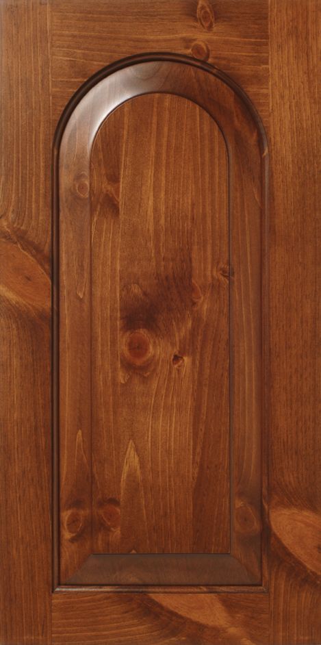 Wooden door panel with arched inset. Dark brown wood grain.