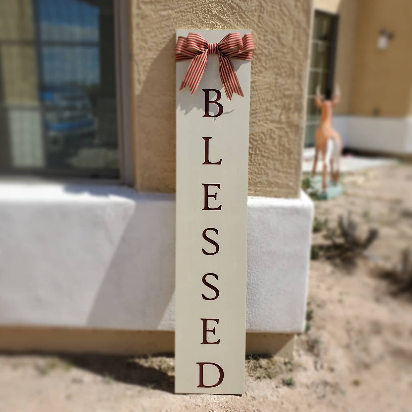 Tan wooden sign with
