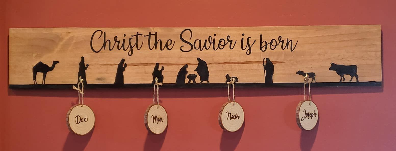 A wooden sign with the words