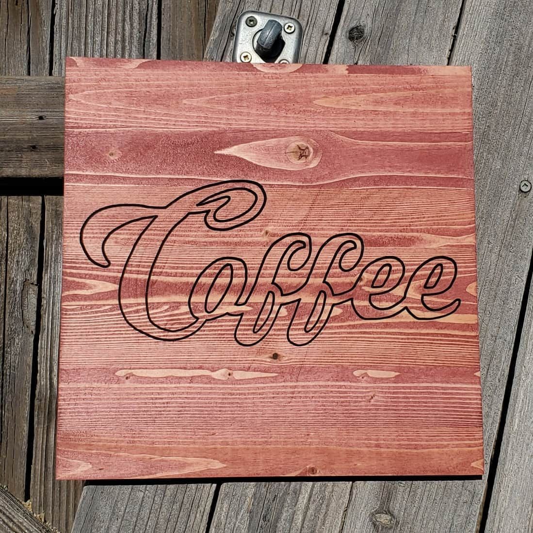 Wooden sign with etched