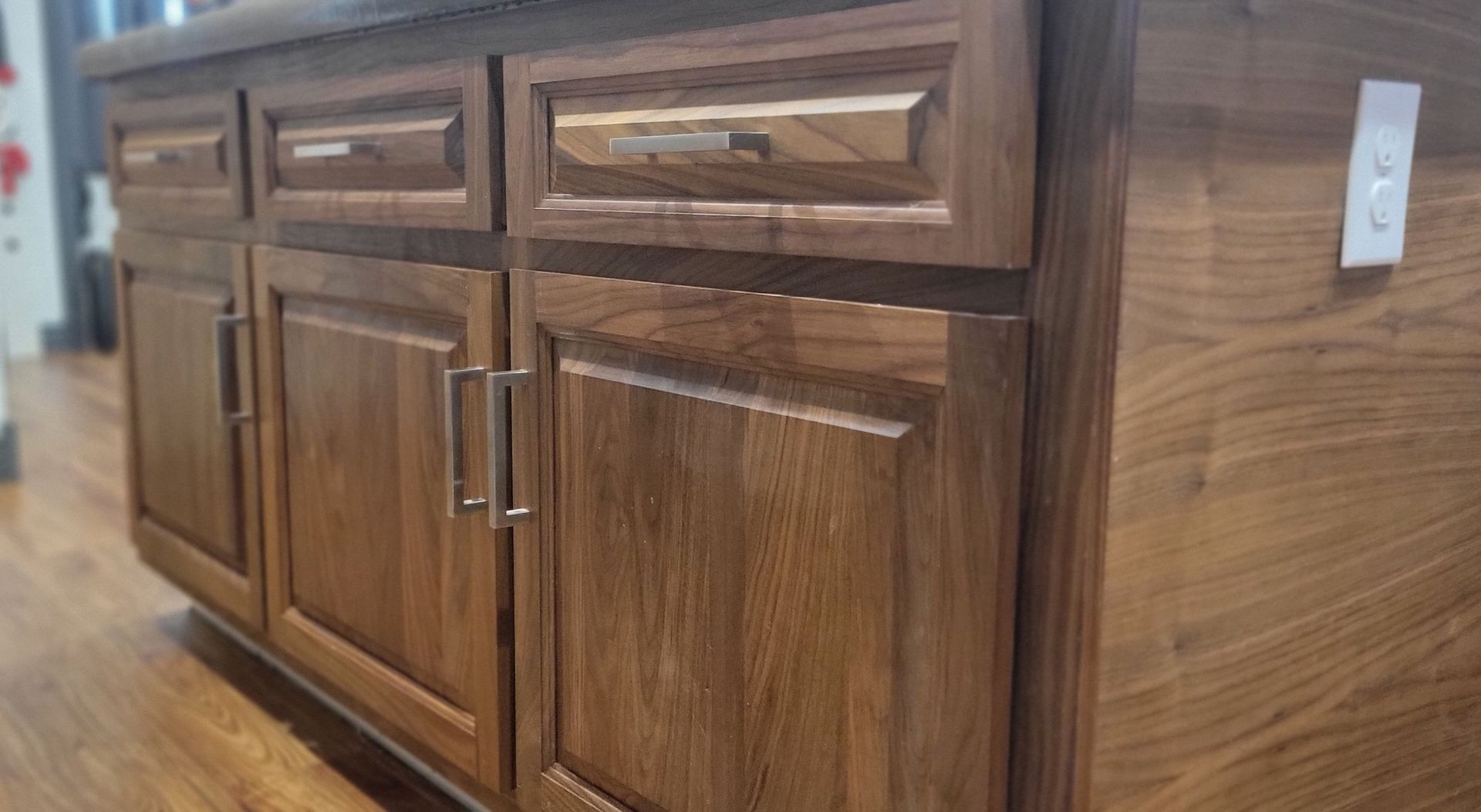 Wooden kitchen cabinets with drawers and doors.
