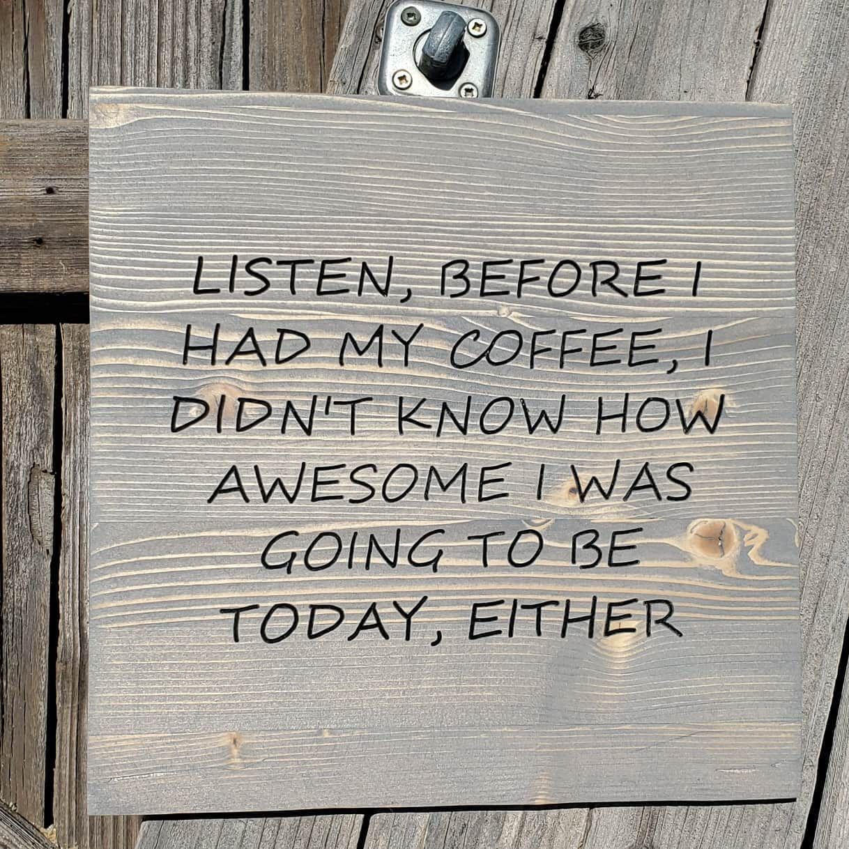 Wooden sign with text: