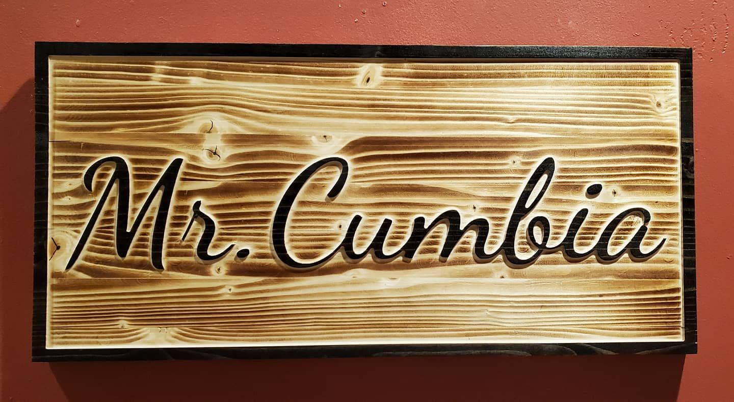 Wooden sign reads