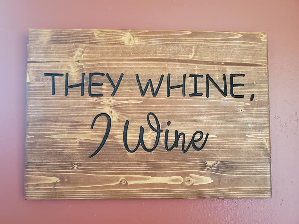 Wooden sign with text: