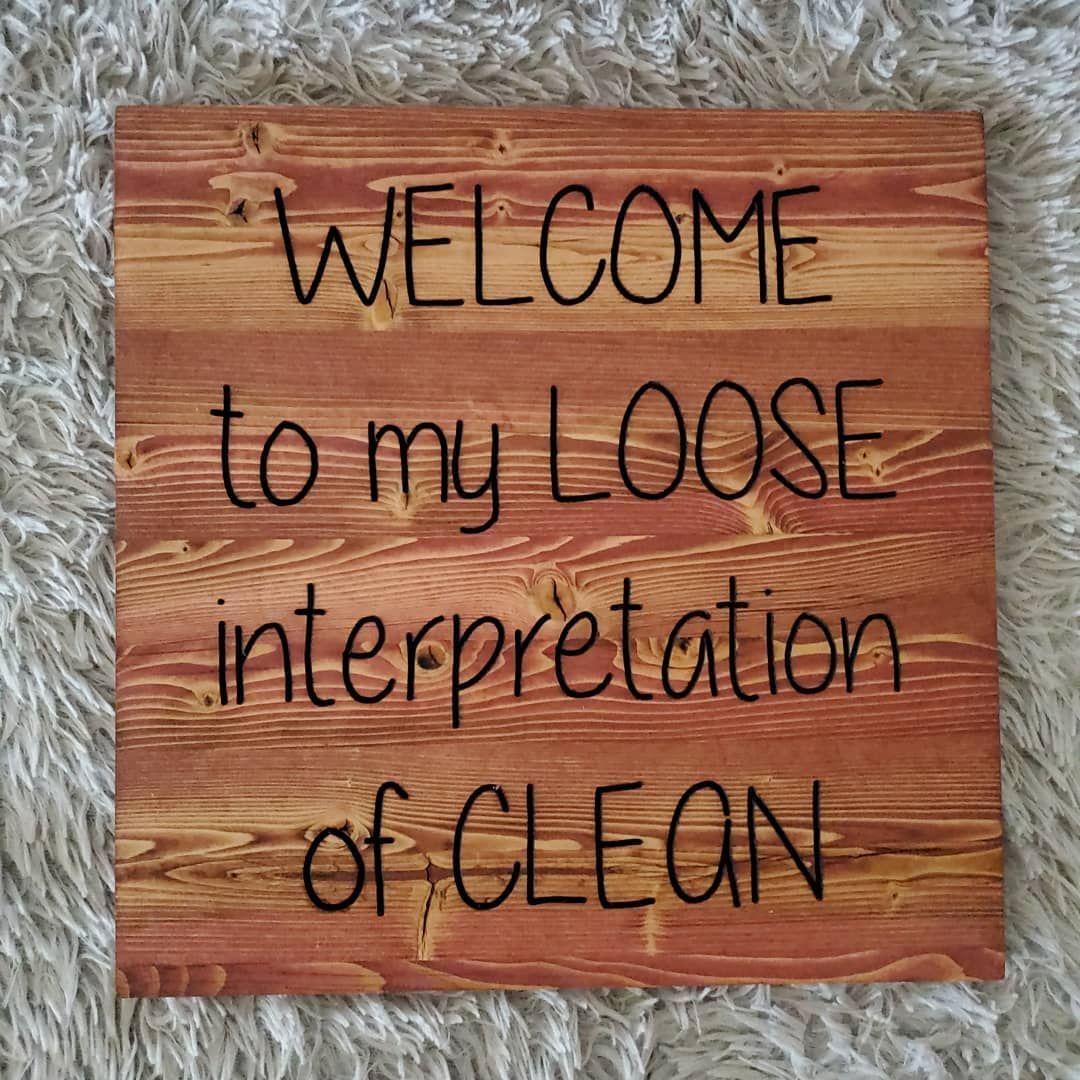 Wooden sign with text: