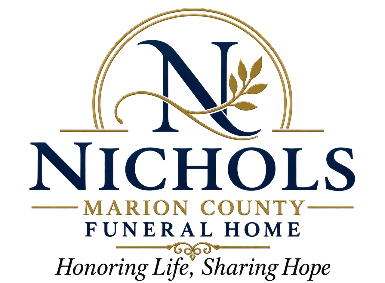 Nichols Marion County Funeral Home logo with gold arch, navy monogram, and “Honoring Life, Sharing Hope.”