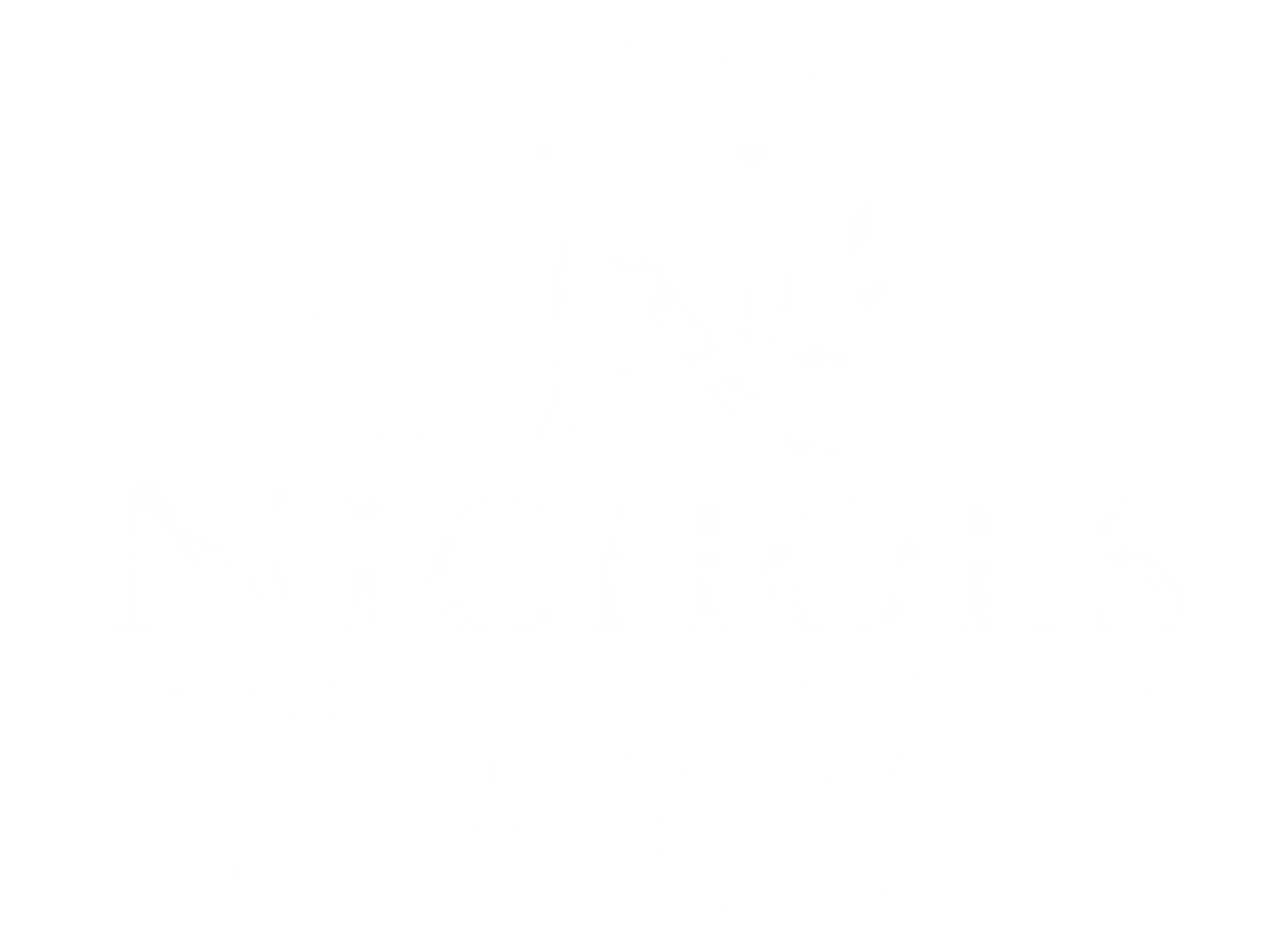 White logo of Nichols Funeral Home