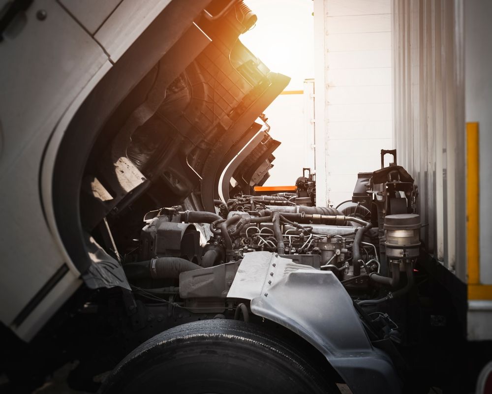The Engine Of A Truck Is Shown With The Hood Open — Hastings Diesel Service In Laurieton, NSW