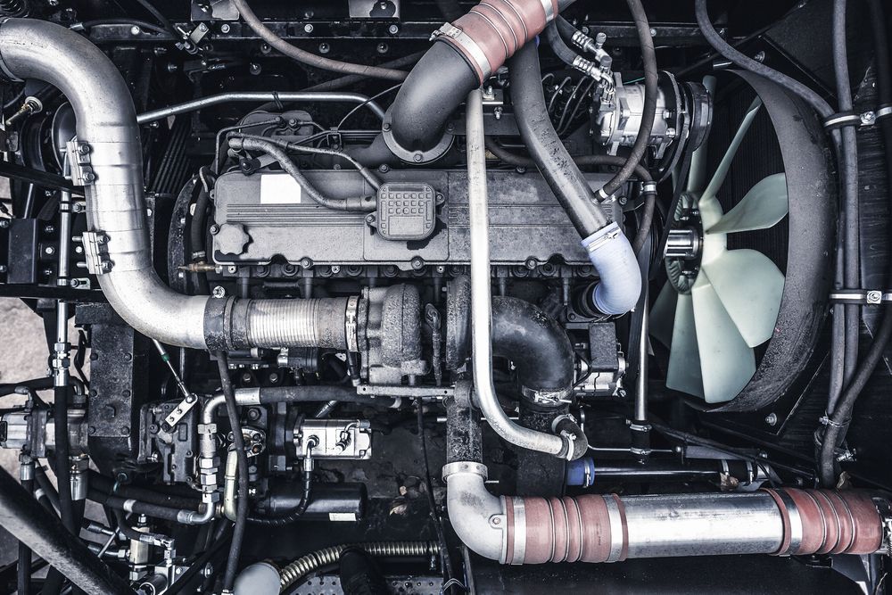 A Close Up Of A Diesel Engine With A Fan — Hastings Diesel Service In Laurieton, NSW