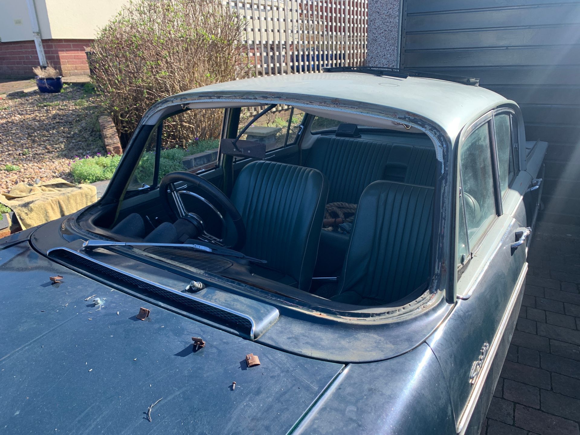 Eziglass - Vehicle Glazing Services gallery image. Escort mk2 windscreen rubber and chip repair.