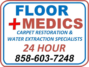 A sign for floor medics carpet restoration and water extraction specialists