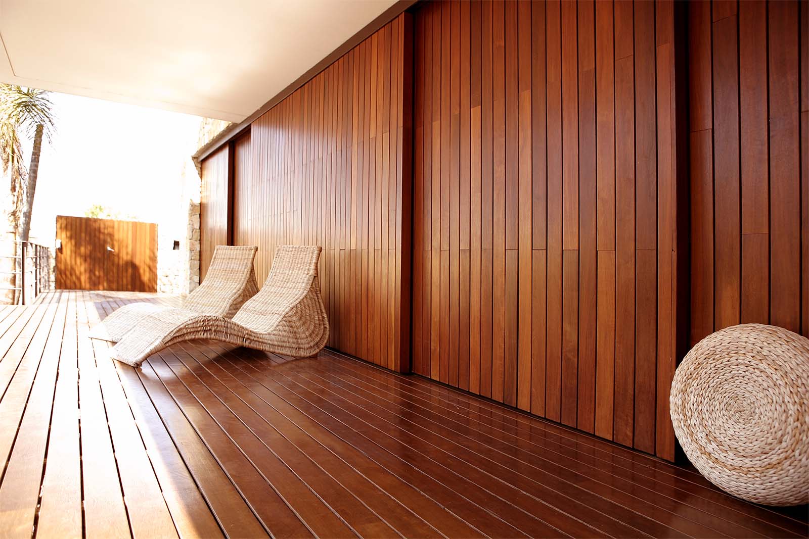 Installation Of Hardwood Timber Deck And Timber Wall Cladding