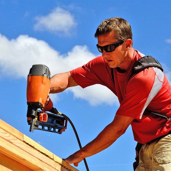 Local Carpenter Contractor Installing Timber House Framing