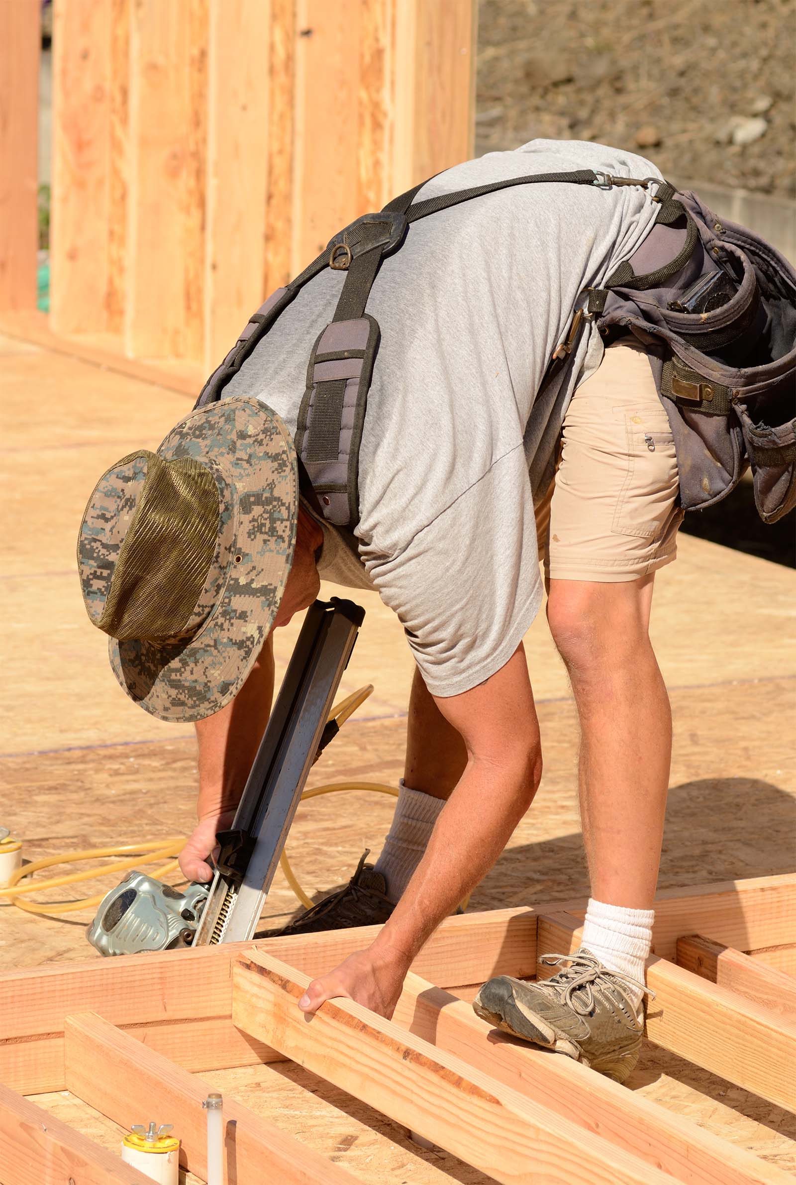 Qualified Carpenter Nailing Wall Framing Together