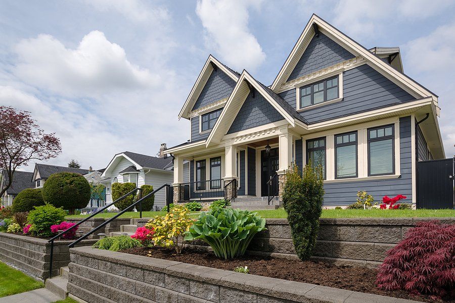 a house with retaining wall on front yard
