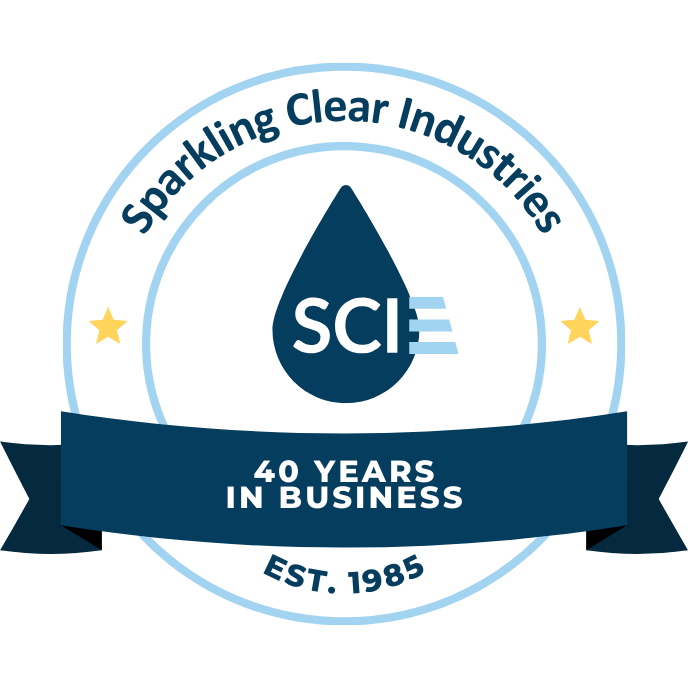A logo for sparkling clear industries 40 years in business