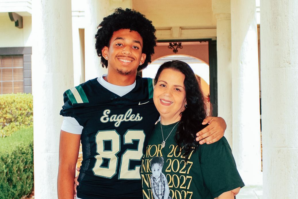 Amber Schoen, SCI employee of 27 years, with her son, Justice.
