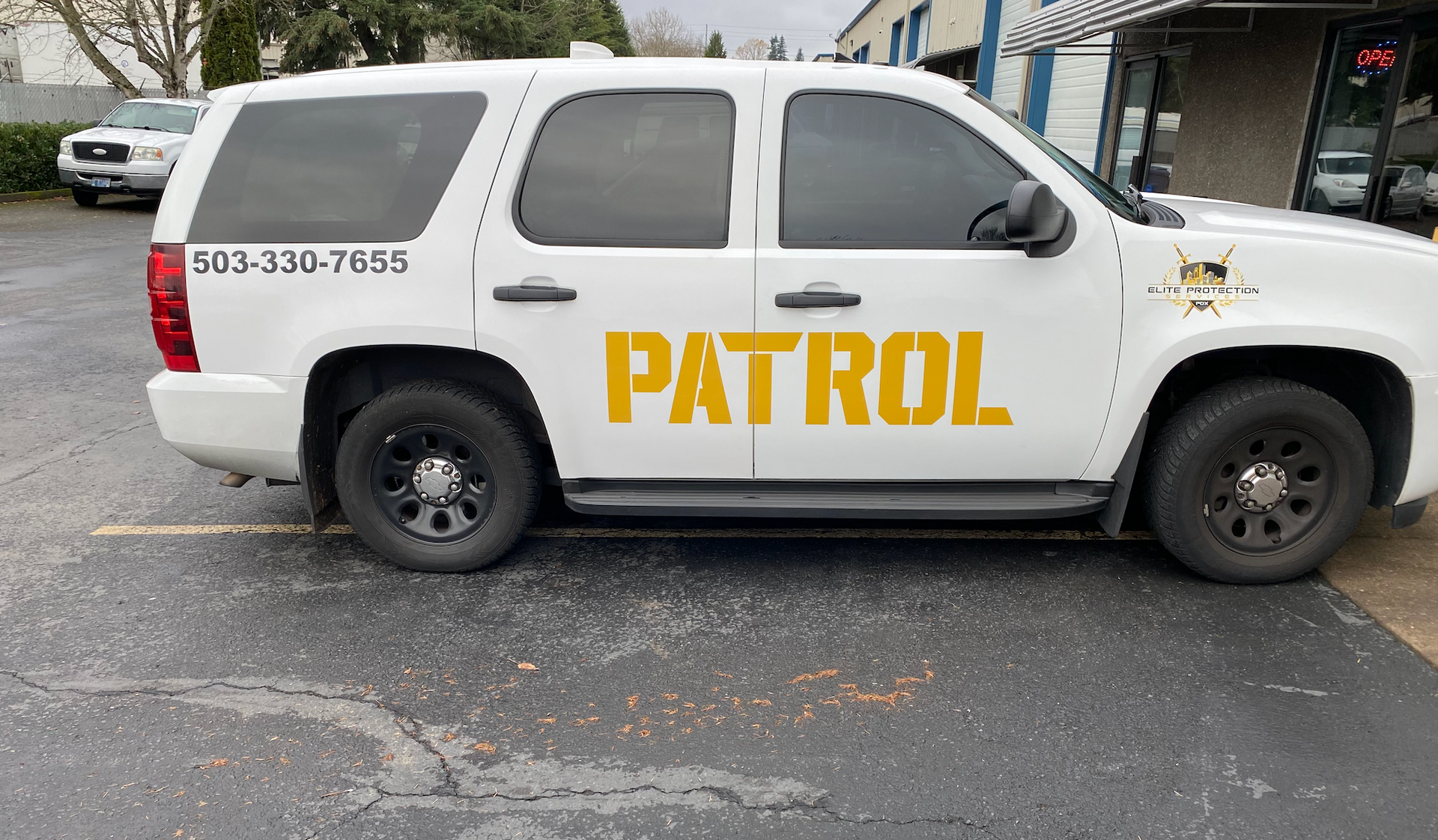 White patrol SUV with tinted windows and 