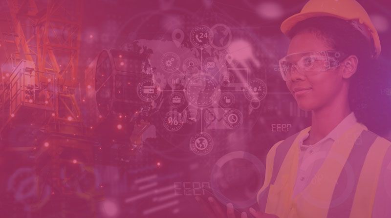 Worker in hard hat and safety vest over a city tech background with glowing digital icons