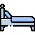 An icon of a bed with a blue mattress on a white background.