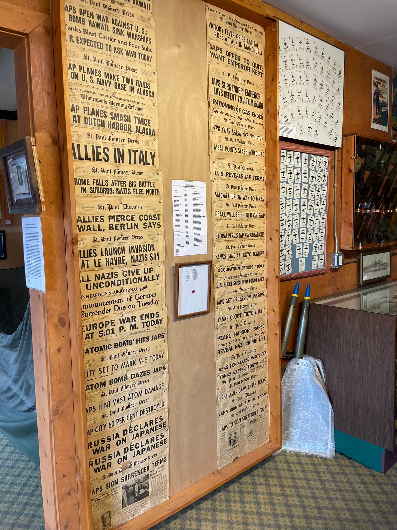 A wooden wall with a sign that says ' made in italy ' on it