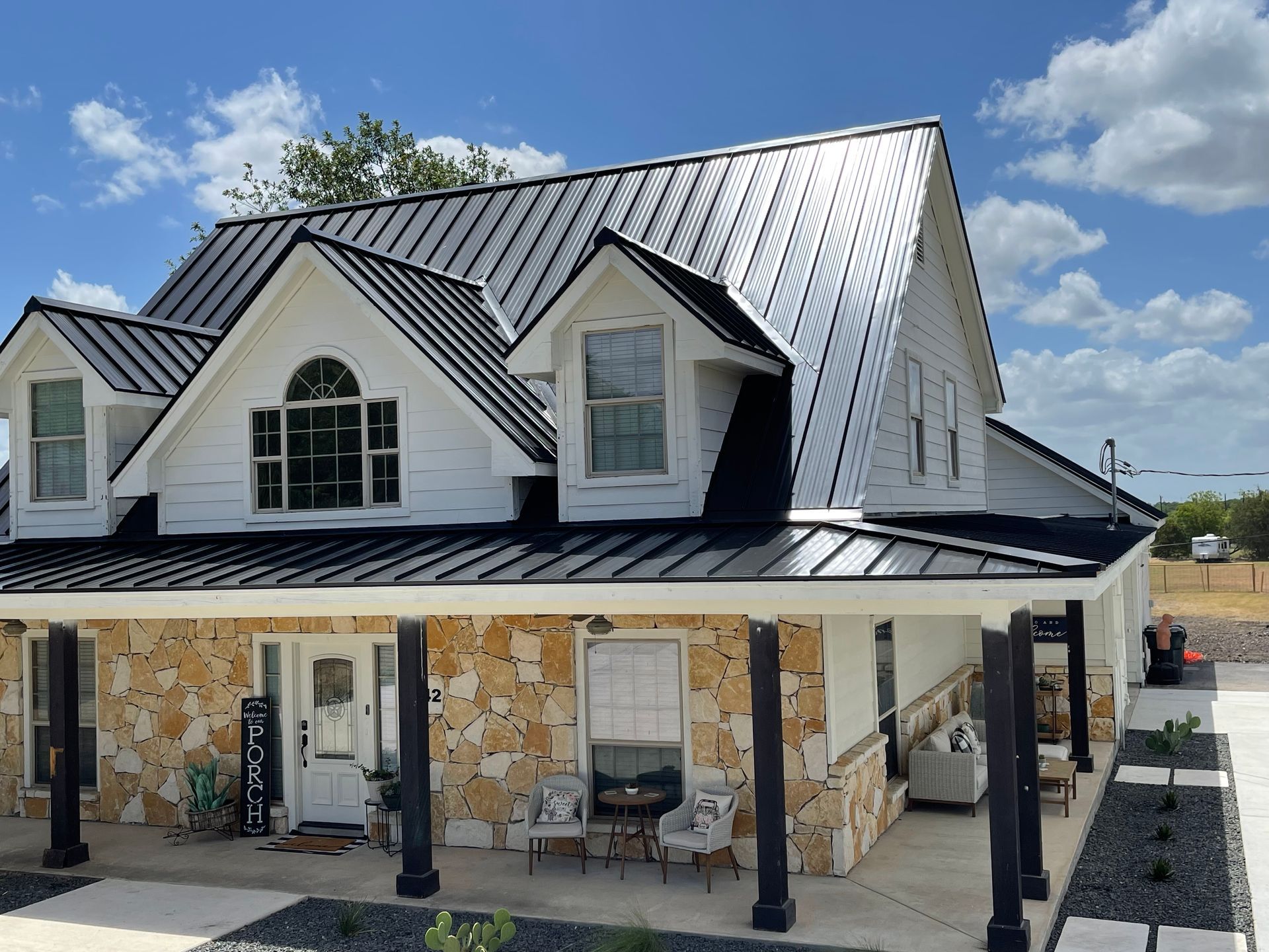 top tier, 24 gauge standing seam metal roofing