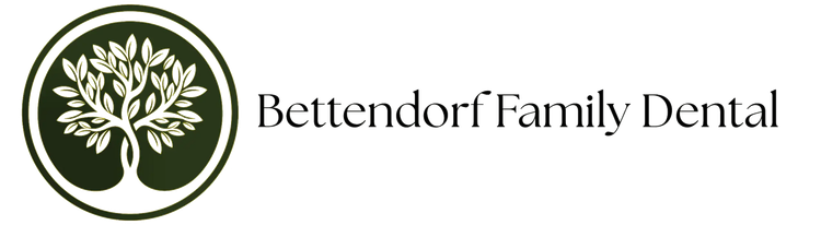 Logo for Bettendorf Family Dental: A tree within a green circle, text to the right.