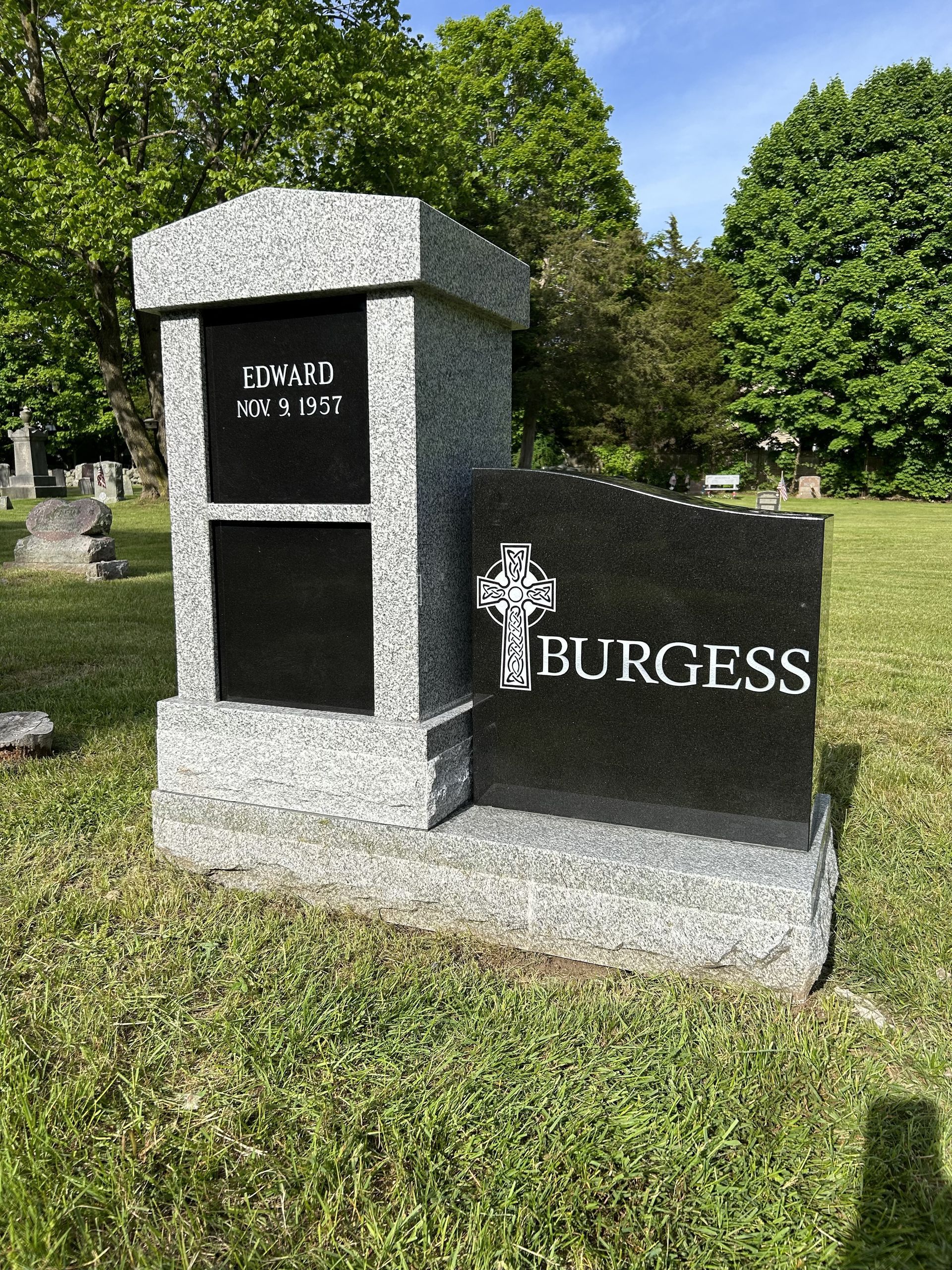 A granite headstone inscribed 