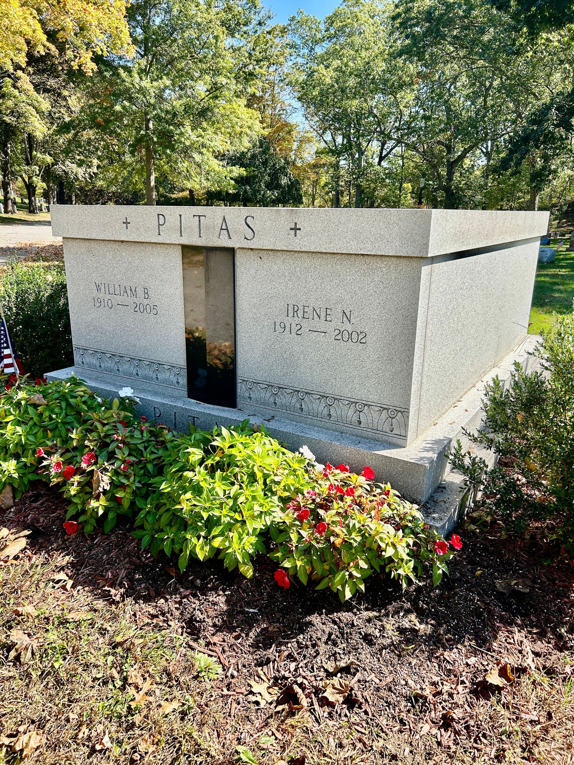 A granite sarcophagus grave marker for the 