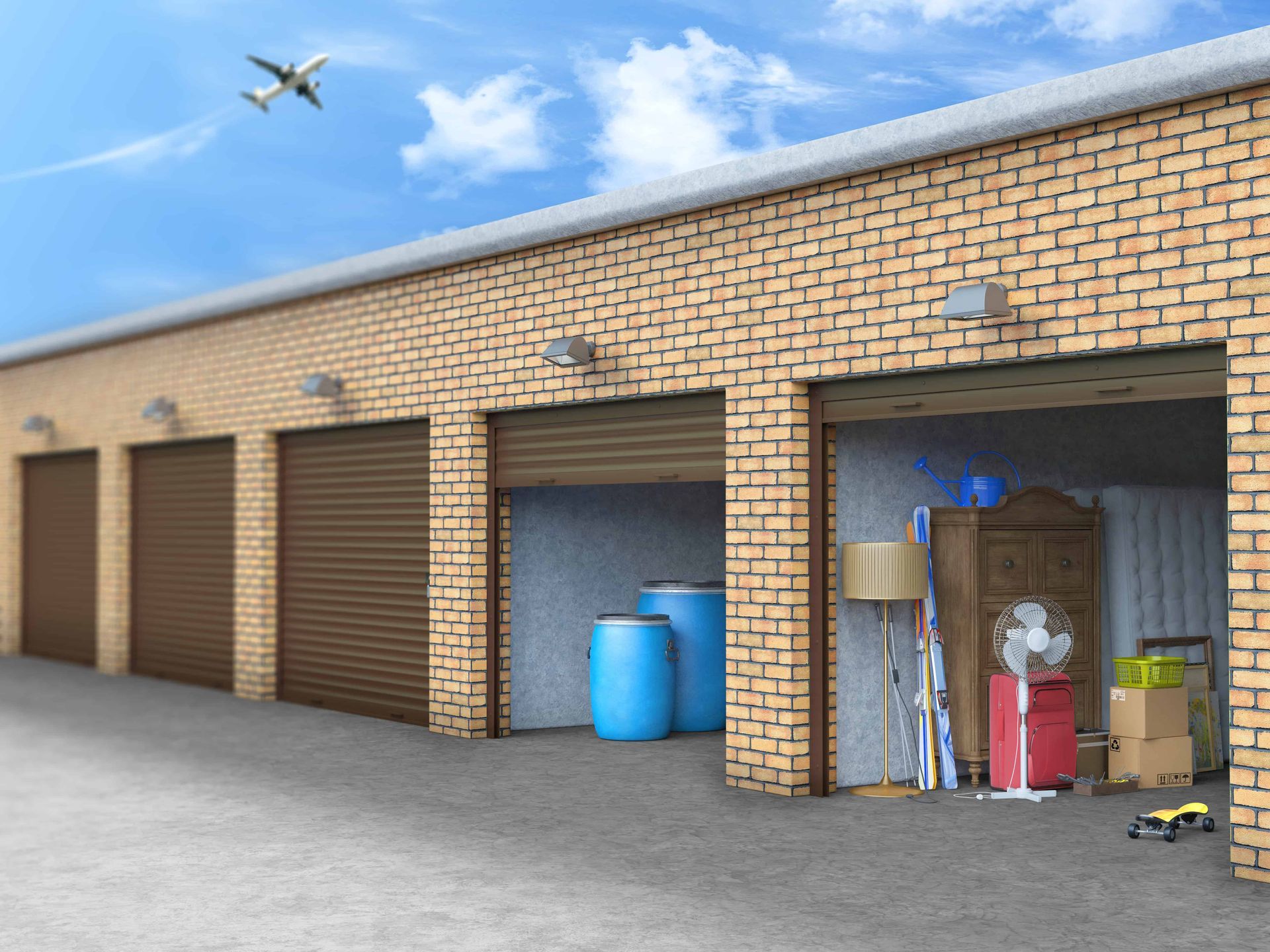 A line of commercial storage units with some open doors