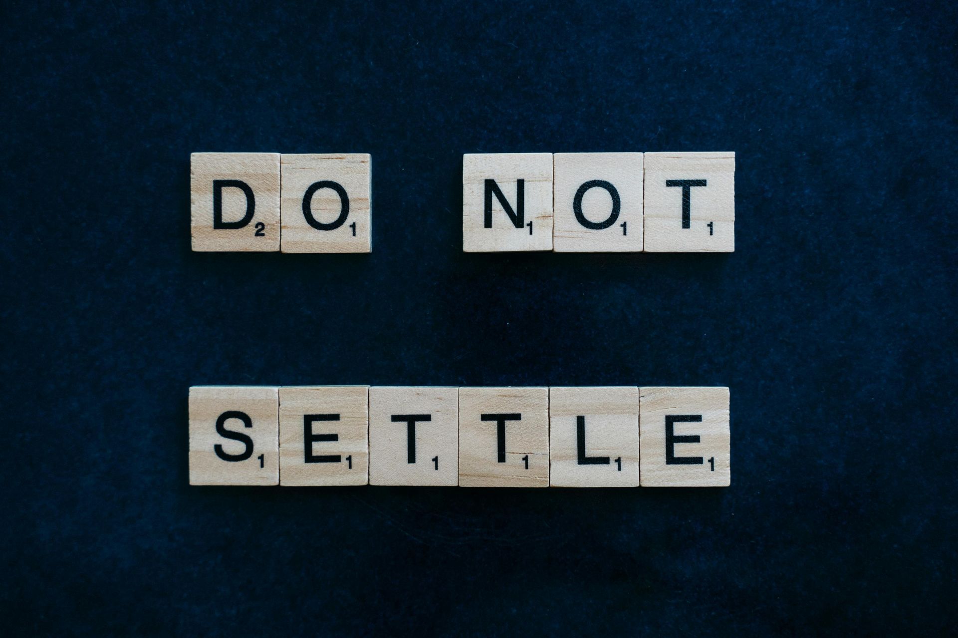 Scrabble tiles spell 